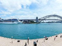 Sydney View 1   A beautiful day in Sydney, Australia with city to the left, Celebrity Solstice docked, the Harbour Bridge and part of the Opera House to the right.